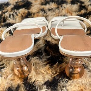 Elegant White Women's Sandals with Unique Heel Design